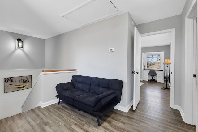 sitting room featuring hardwood / wood-style flooring