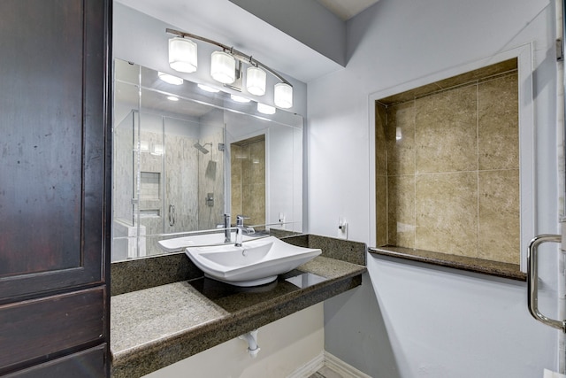 bathroom featuring sink and walk in shower