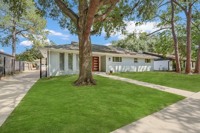 view of front of property with a front lawn