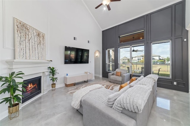 living room featuring high vaulted ceiling and ceiling fan