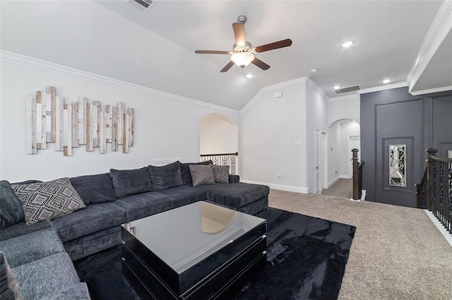 carpeted living room with crown molding, lofted ceiling, and ceiling fan