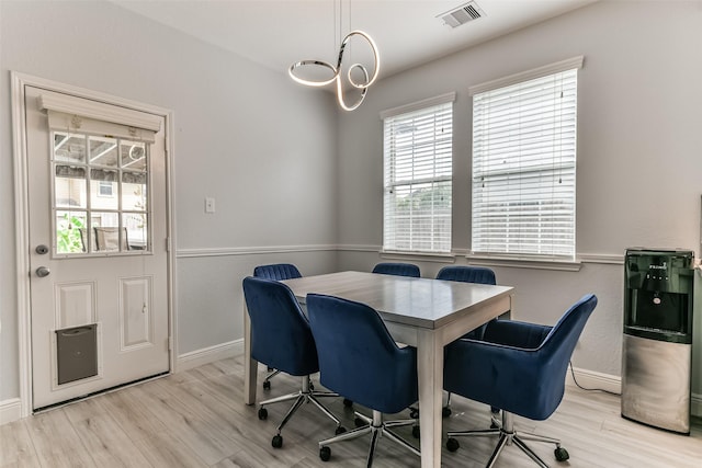 dining room featuring light hardwood / wood-style floors