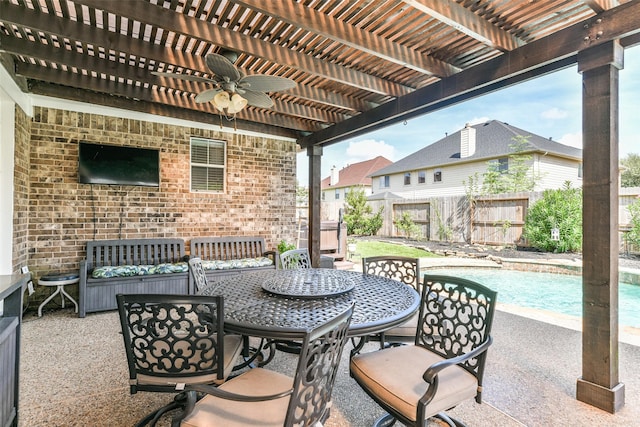 view of patio with a fenced in pool, ceiling fan, and a pergola