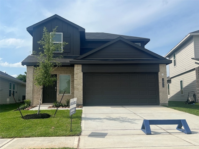 traditional-style home with a front lawn, board and batten siding, an attached garage, driveway, and brick siding