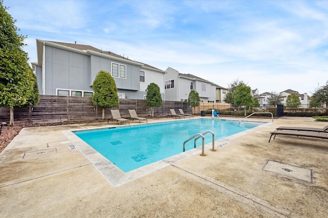 view of pool featuring a patio area