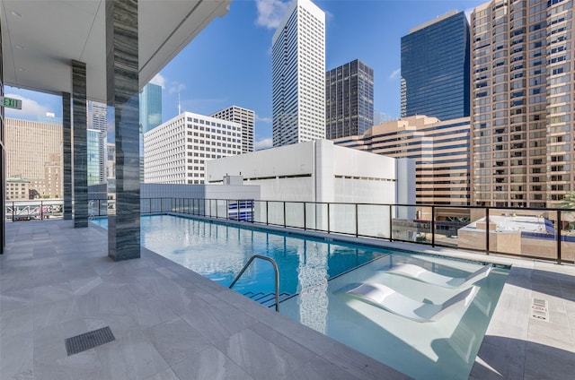 view of pool with a patio area