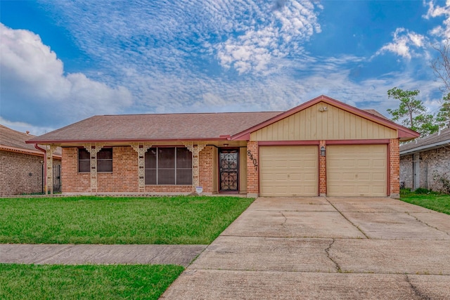 single story home with a garage and a front lawn