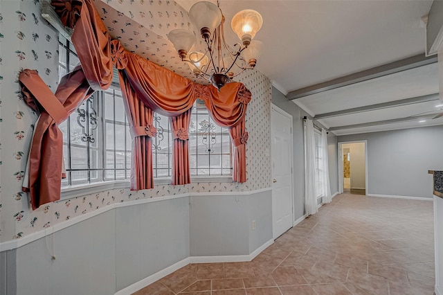 unfurnished dining area with beamed ceiling, tile patterned flooring, and an inviting chandelier