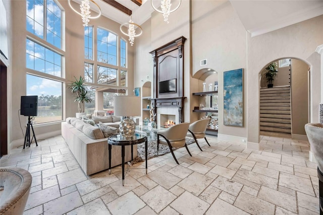 living room featuring a notable chandelier