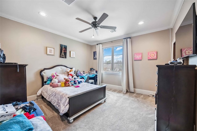 carpeted bedroom with ornamental molding and ceiling fan