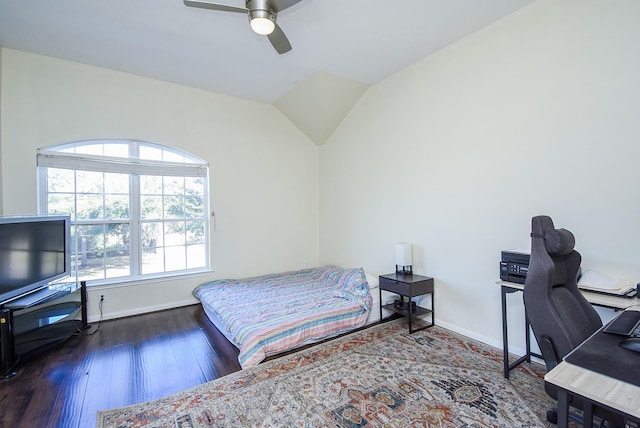 bedroom featuring vaulted ceiling, ceiling fan, and dark hardwood / wood-style flooring