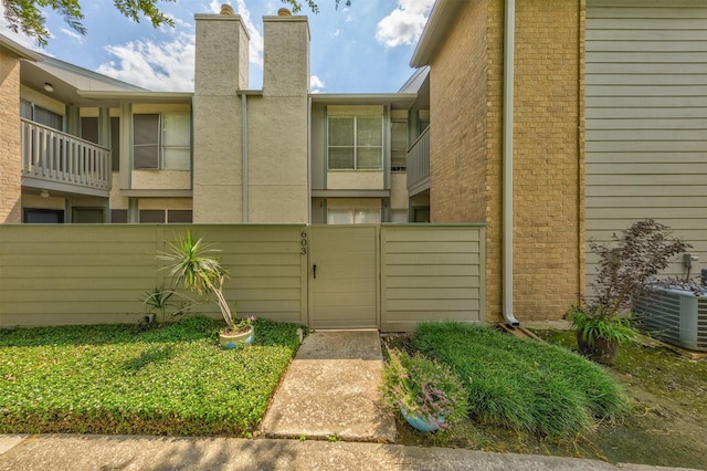 exterior space featuring central AC unit