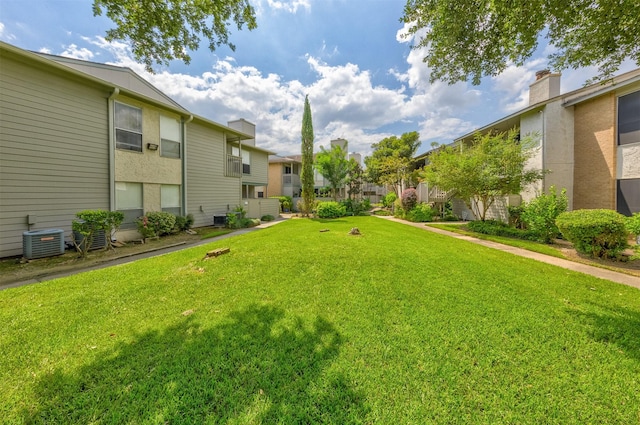 view of yard featuring central AC