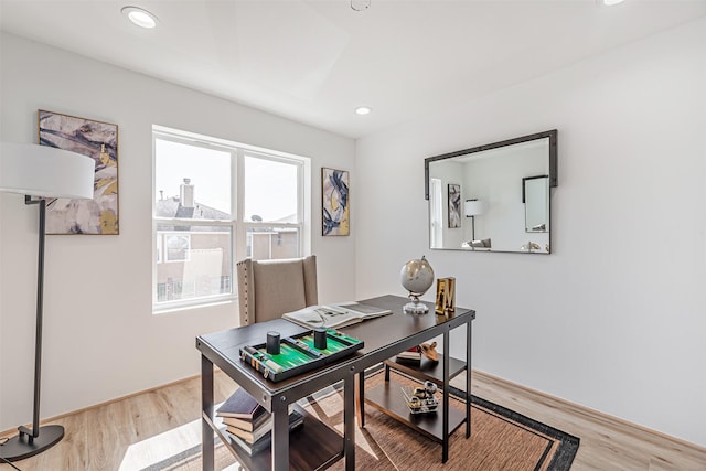 office space with light wood-style flooring and recessed lighting