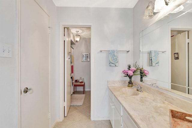 bathroom with vanity and tile patterned flooring