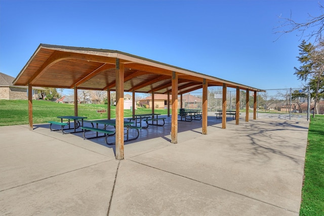 view of property's community with a yard and a gazebo