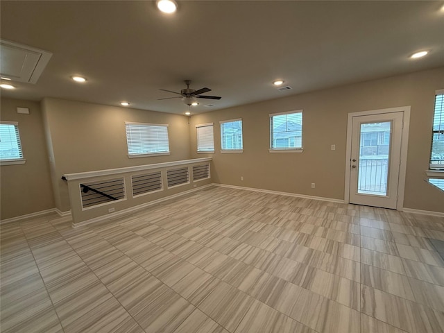 unfurnished room featuring ceiling fan