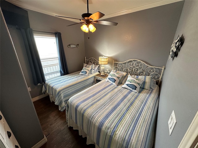 bedroom featuring ceiling fan, ornamental molding, and dark hardwood / wood-style floors