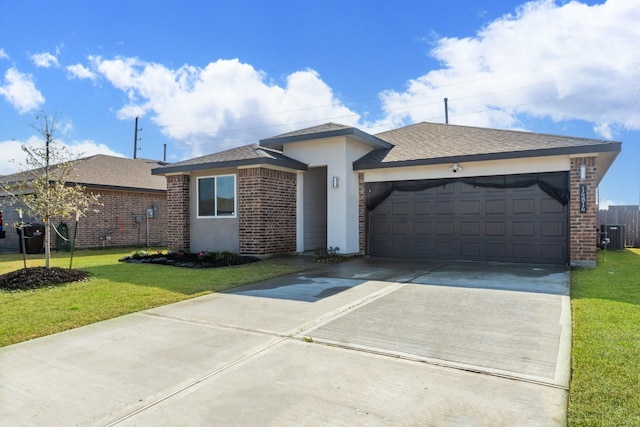 single story home featuring a garage, a front yard, and central air condition unit