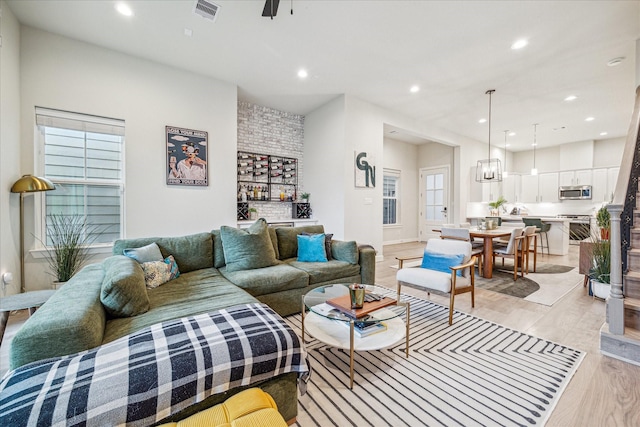 living room featuring light wood-type flooring