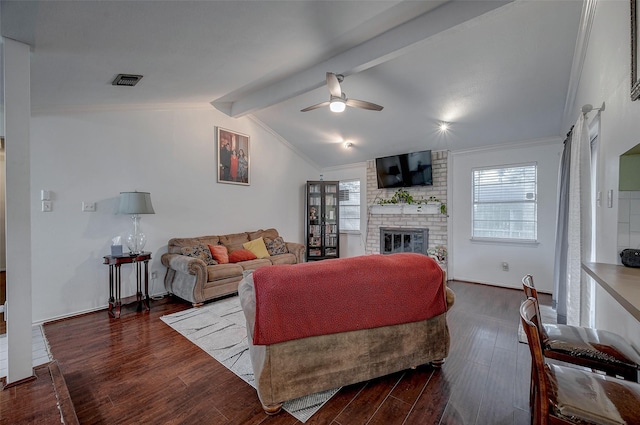 living room featuring crown molding, a brick fireplace, vaulted ceiling with beams, and dark hardwood / wood-style flooring