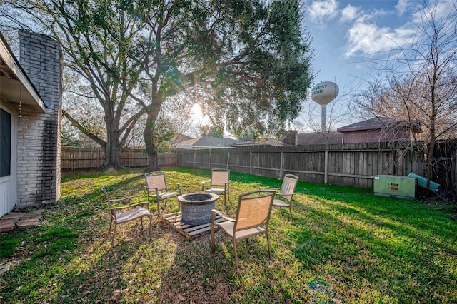 view of yard featuring a fire pit