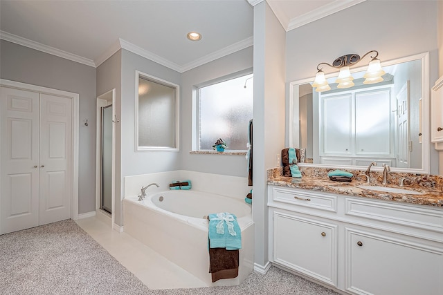 bathroom featuring crown molding, vanity, and shower with separate bathtub