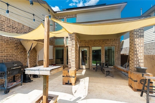 view of patio / terrace with grilling area and exterior bar