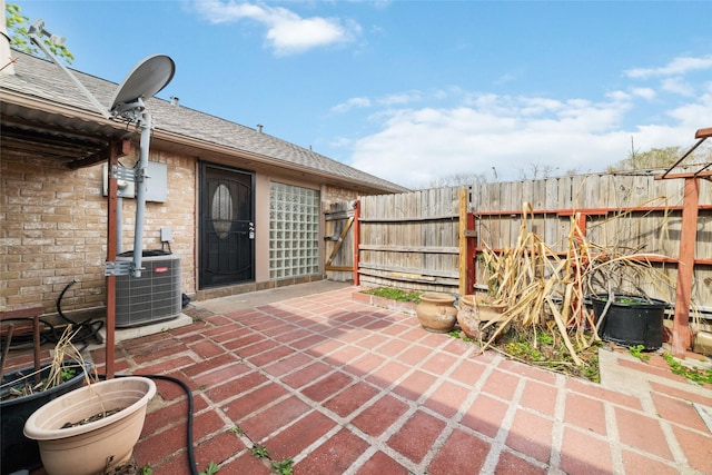 view of patio featuring central AC unit