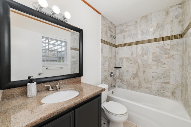 full bathroom with vanity, toilet, and tiled shower / bath combo