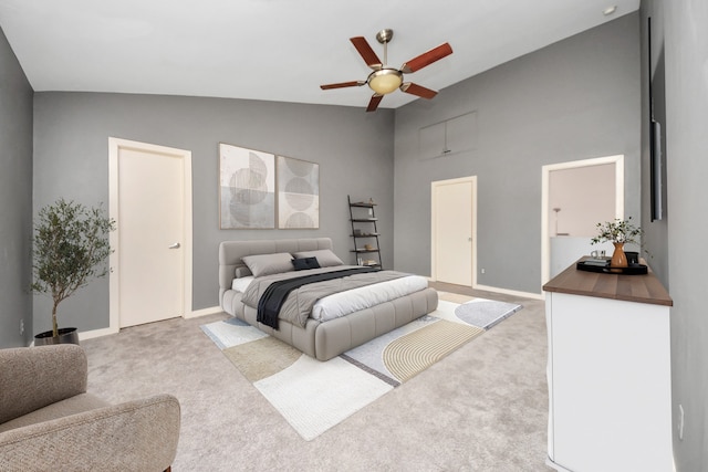 carpeted bedroom with lofted ceiling and ceiling fan