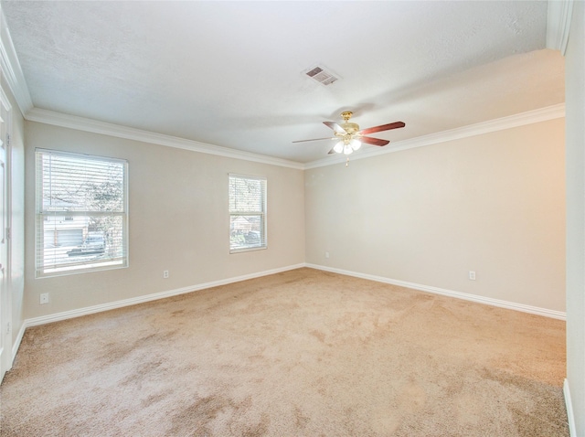 unfurnished room with ornamental molding, light carpet, a textured ceiling, and ceiling fan