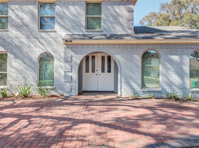 property entrance with a patio