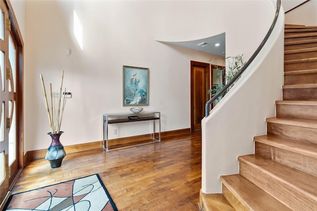 entryway with wood-type flooring