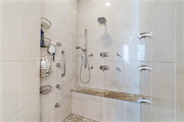 bathroom featuring tiled shower