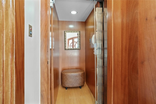 hallway featuring elevator