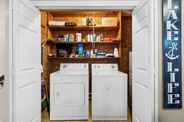 washroom featuring washing machine and dryer