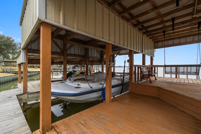 dock area with a water view