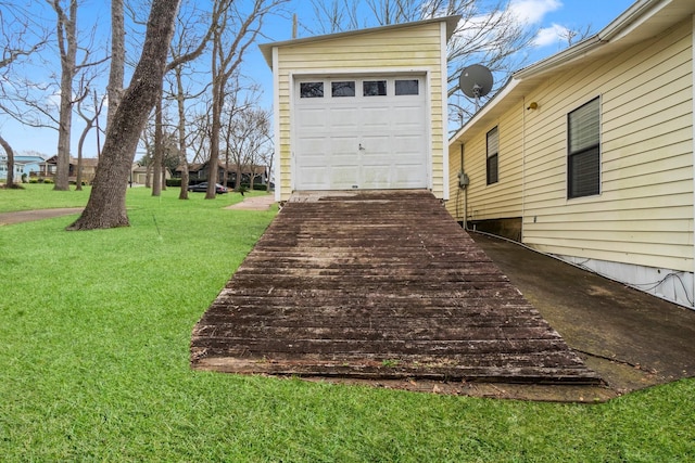 garage with a yard