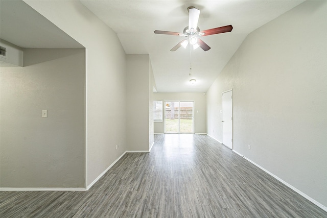 unfurnished room with ceiling fan and dark hardwood / wood-style floors