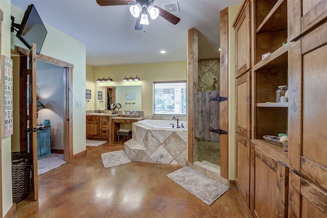 bathroom featuring ceiling fan, vanity, plus walk in shower, and concrete floors