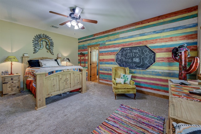 carpeted bedroom featuring ceiling fan