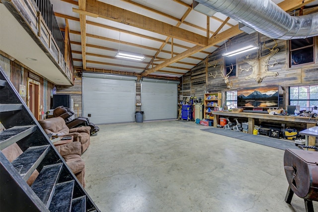 garage with a workshop area