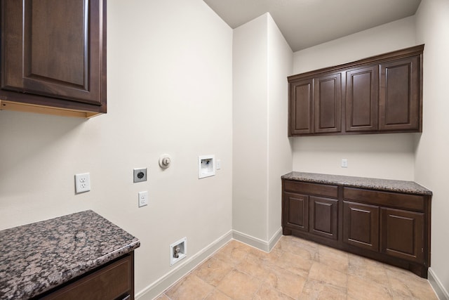 laundry room featuring cabinets, gas dryer hookup, hookup for a washing machine, and hookup for an electric dryer