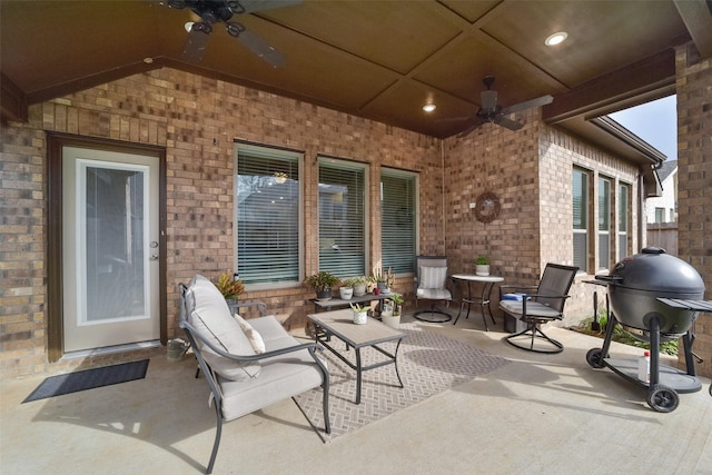 view of patio featuring ceiling fan and grilling area