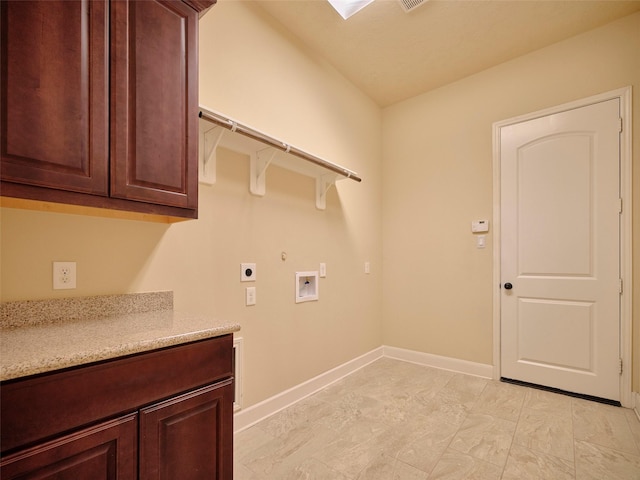 laundry area with cabinets, washer hookup, and hookup for an electric dryer