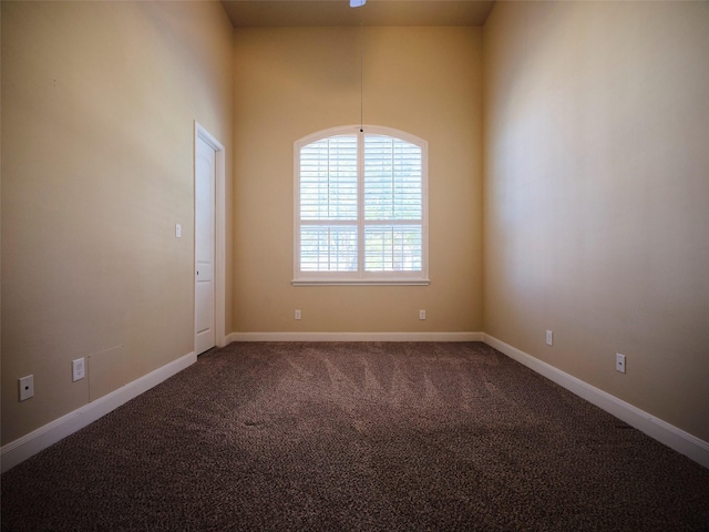 unfurnished room with carpet floors