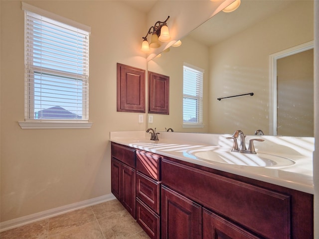 bathroom with vanity and tile patterned flooring