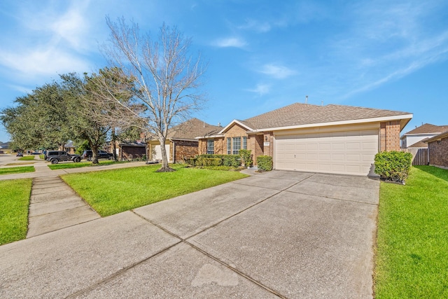 single story home featuring a garage and a front yard