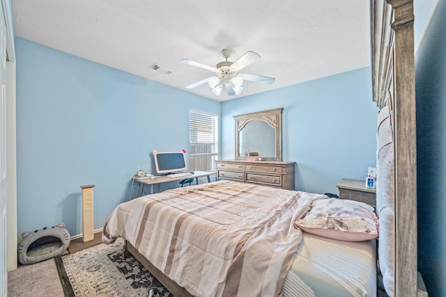 bedroom featuring ceiling fan